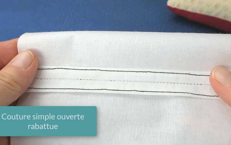 Finition couture simple ouverte rabattue